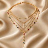 White gold necklace and earring set with multicoloured stones