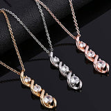 White gold necklace with infinity pendant and zircons