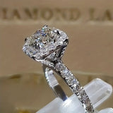 White gold ring with embedded zirconia stone