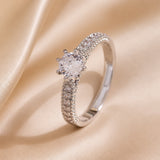 Essential white gold ring with embedded zirconia
