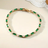 Alternating Gold and Emerald Tennis Bracelet