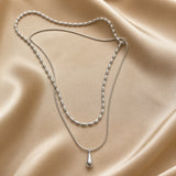 Double-layer white gold necklace with drop-shaped pendant