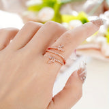 Ring with Butterflies and Embedded Zirconia in White Gold