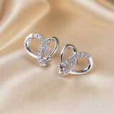 Geometric Stud Earrings in Zirconium and White Gold