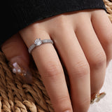 Essential white gold ring with embedded zirconia