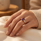 Gold Ring with Amethyst and Three Stones
