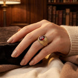 Gold ring with ruby engraving