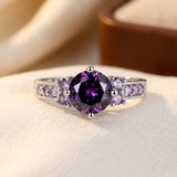 Silver ring with amethyst and side stones