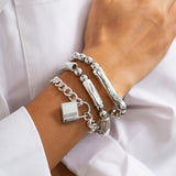 Collection of Bracelets with White Gold Beads and Punk Style Clasp
