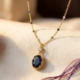 Oval Pendant Necklace in Gold and Sapphire