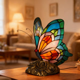 Handgefertigte Glaskerze mit Schmetterling