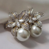 Dangling earrings with flower and daisy