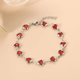 Silver Chain Bracelet with Heart-Shaped Ruby
