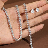 Stunning complete wedding set in clear round cubic zirconia