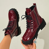 Thea - Women's waterproof patent combat boot