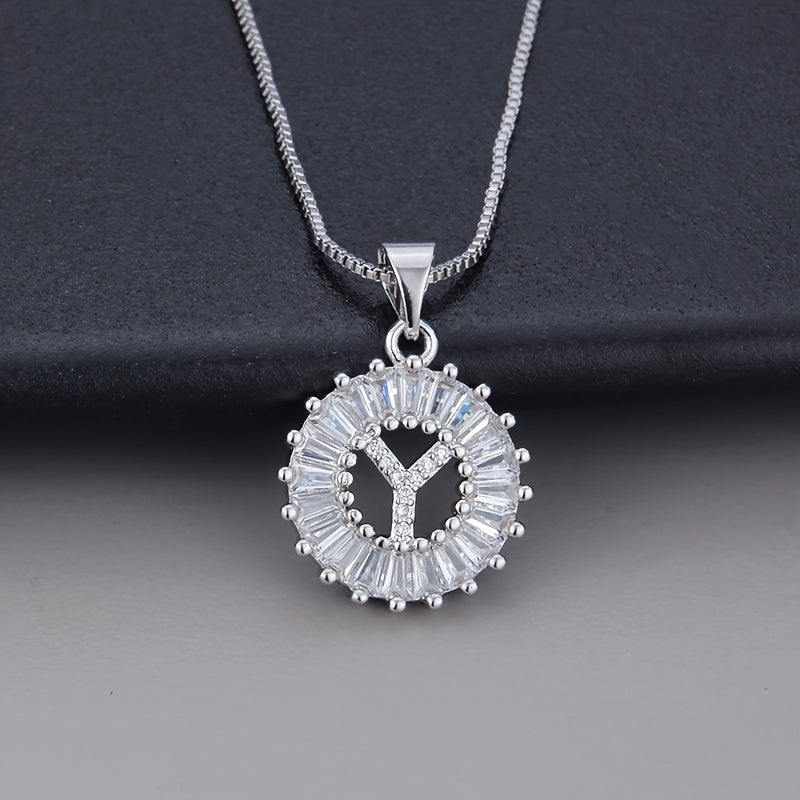 White gold necklace with initial "Z" and zirconia