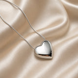 Elegant Necklace with Puff Heart Pendant in White Gold