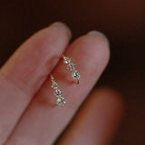 White gold earrings with small zirconiums